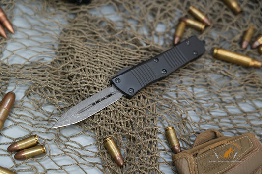 Microtech 138-16S Signature Series Troodon AUTO OTF 3.06" Damascus Double Edged Dagger Blade, Black Aluminum Handles